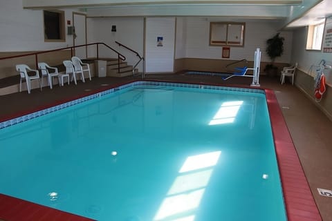 Dive into a refreshing indoor pool for year-round fun.