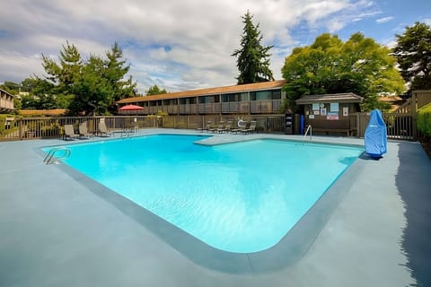 Dive into a sparkling outdoor pool for sunny, carefree breaks.