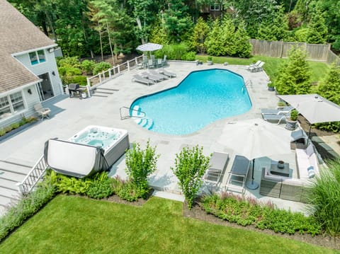Outdoor haven - heated gunite pool and hot tub