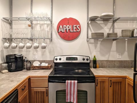 Our kitchen features a 4 burner electric stove and oven.