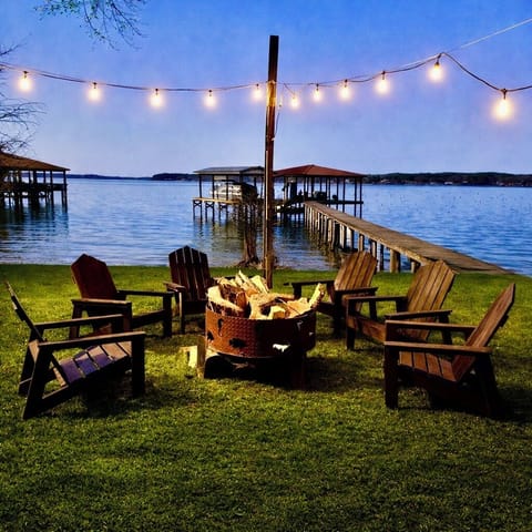Fire pit area overlooking the lake and boathouse area
