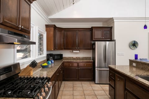 Gas grill and all the amenities needed are in the kitchen.