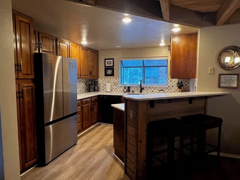 Kitchen, on 2nd floor as looking from the family room. Well-equipped for cooking
