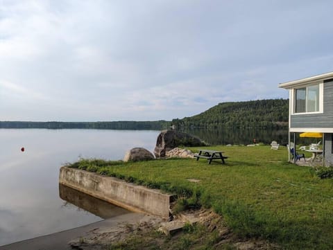 Go for a swim or take out a kayak from your private beach.