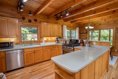 Kitchen open to adjacent Dining Area