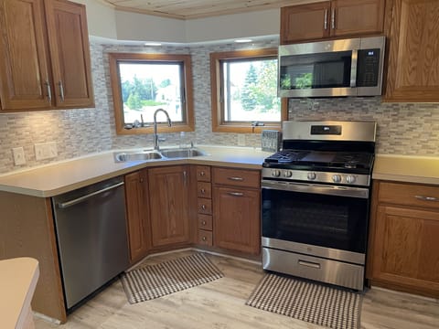 Remodeled kitchen with new appliances.