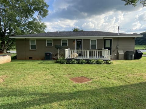 Back of the house with deck