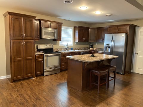 Fully stocked kitchen and island