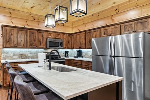 This huge dining table/kitchen island makes it a breeze to serve your delicious meals