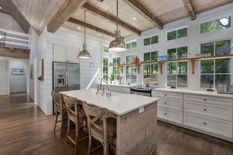 custom kitchen | modern lighting | marble counter tops | main level 