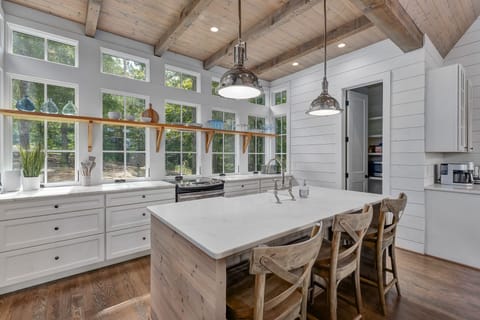 custom kitchen | modern lighting | marble counter tops