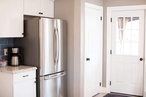 Eat-in Kitchen- Fully stocked kitchen with stainless appliances and prep space.