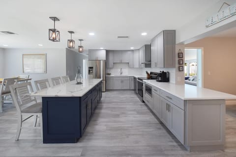 This 5 Bedroom home has open plan, modern furniture and fittings throughout, with space for all the family.