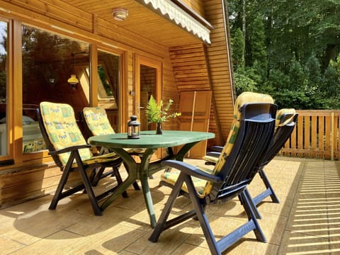 Property, Furniture, Table, Plant, Wood, Outdoor Furniture, Shade, Outdoor Table, Building, Interior Design