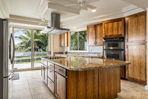 Upgraded kitchen with stainless steel appliances, granite countertops, and high-end touches—perfect for group cooking.
