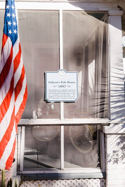 Our Historic Building plaque tells the unique story of Gideon's Fish House