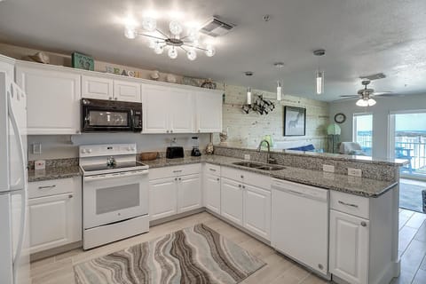 Kitchen - Full kitchen perfect for preparing your catch of the day!