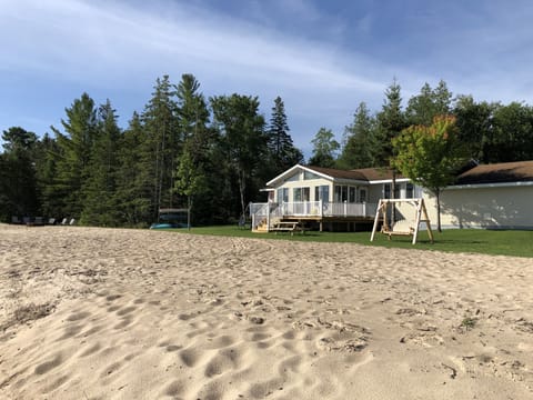 240 feet of private sandy Lake Huron beach.