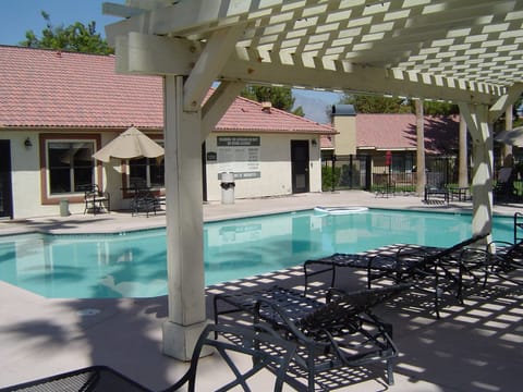 Lounge around the pool on a sunny afternoon !