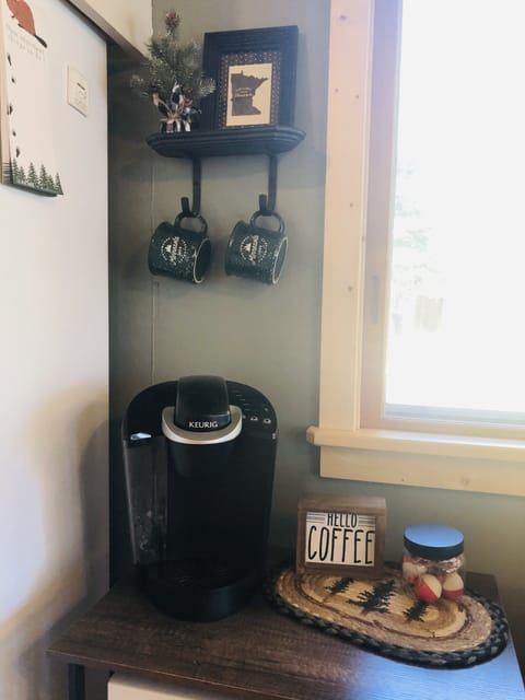 Coffee bar includes Keurig coffee maker. Coffee pot stored in pantry.