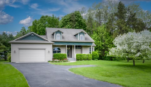 Exterior- attached garage, plenty of driveway parking