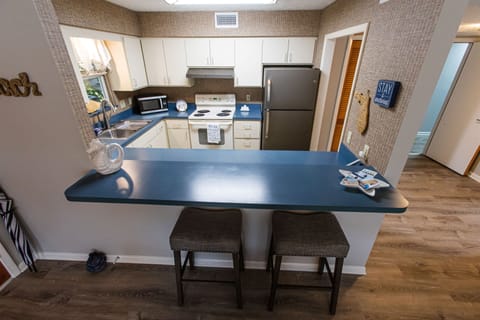 Opposite living area is the kitchen