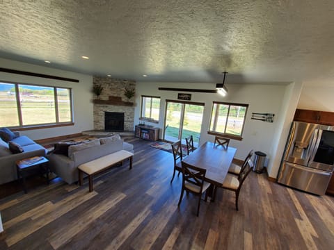 Living, dining and door to patio.