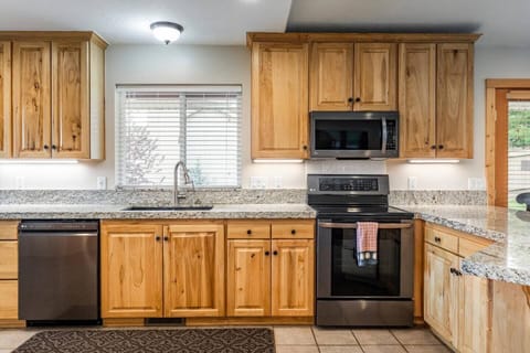 Large a clean kitchen with all updated appliances and granite countertops
