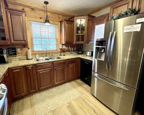 New huge fridge in the kitchen (one of two full size fridges in this unit!)