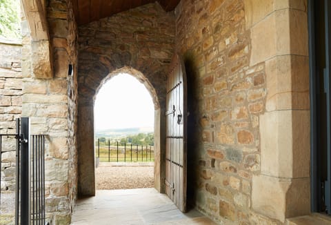 Stonework walls, complete with arches and tower