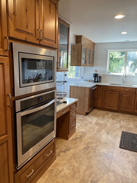 Microwave and oven in kitchen