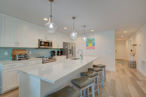 Quartz counter, stainless appliances & everything needed to cook or unwind