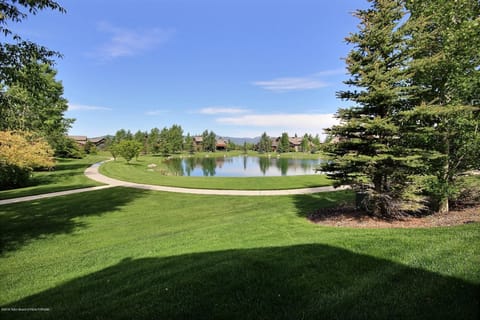 View of walking paths, pond and Big Hole Mountains from back porch. 