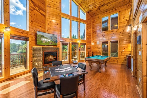 Grand Living Room- High ceilings, large windows, fireplace and entertainment