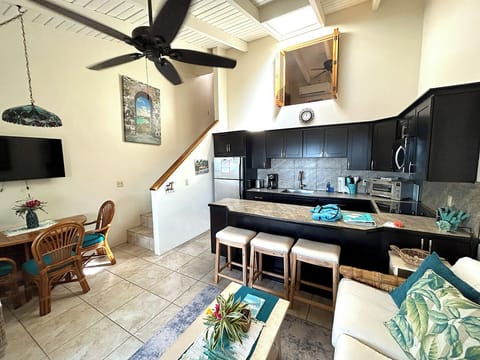 The interior dining table can seat 2-4 people.  The staircase brings you to the bedroom and bathroom level.