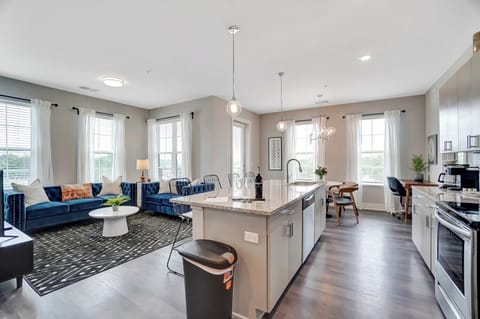 Large kitchen island with lots of counter space and seating