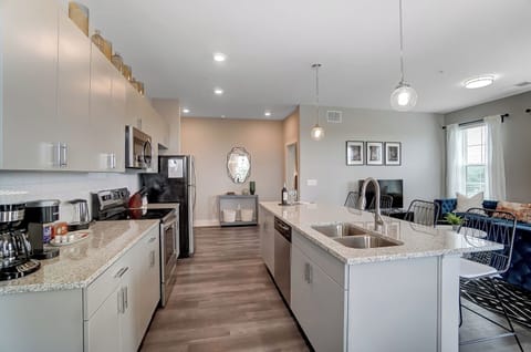 Large chef's kitchen with tons of cabinets and counter space (dishes and cookware included!)