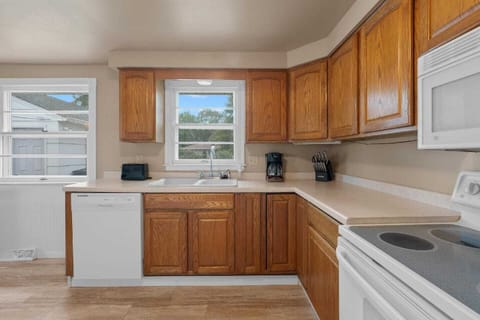 Fully stocked kitchen with dining table