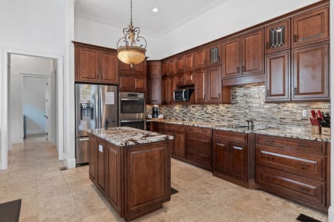 Fully equipped chef’s kitchen with double ovens