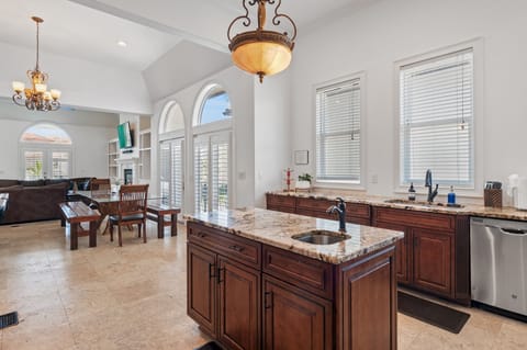 Kitchen island with prep sink and ample workspace