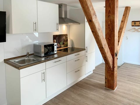 Cabinetry, Countertop, Kitchen Stove, Kitchen Appliance, Drawer, Wood, Building, Sink, Kitchen, Stove