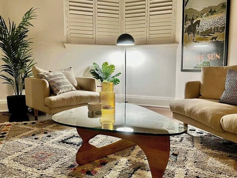 A cozy nook by the window—ideal for morning coffee or winding down with a book.