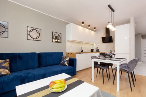 Living room with a comfortable sofa and TV. 