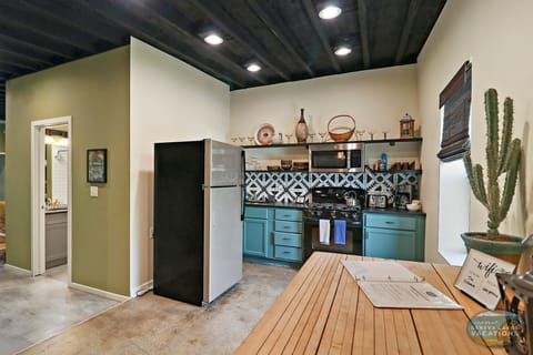 Full kitchen with butcher block workspace