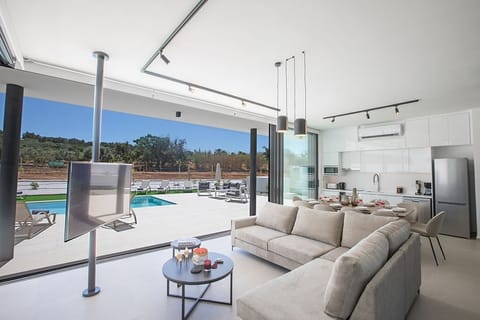 Ground Floor surrounded by large bi-fold patio doors leading to the garden