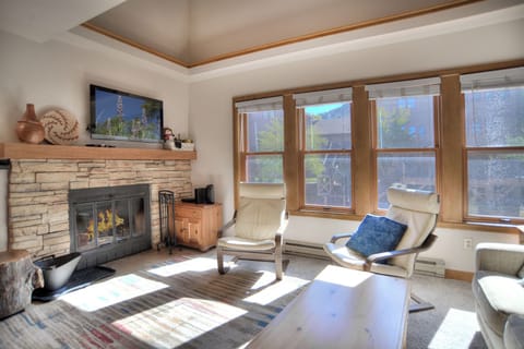 Inviting Living Area with Fireplace and Smart TV