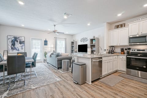Time to RELAX for a lil entertainment in this spacious living/dining area.