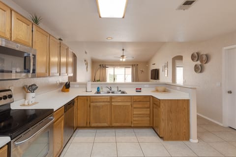 Open concept kitchen to family room - with breakfast bar seating too
