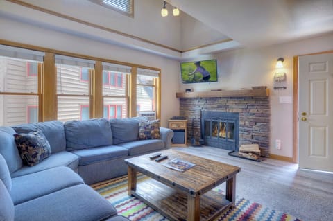 Living Area with Fireplace and Smart TV