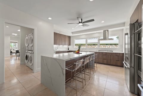 Modern kitchen island with bar seating—perfect for casual breakfasts or evening wine.